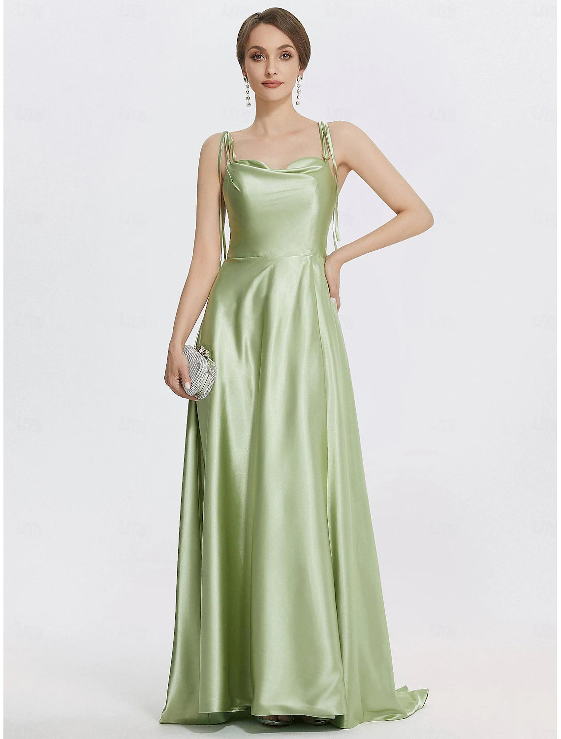 A-line floor-length satin evening gown in mint green with spaghetti straps and a ruched slit