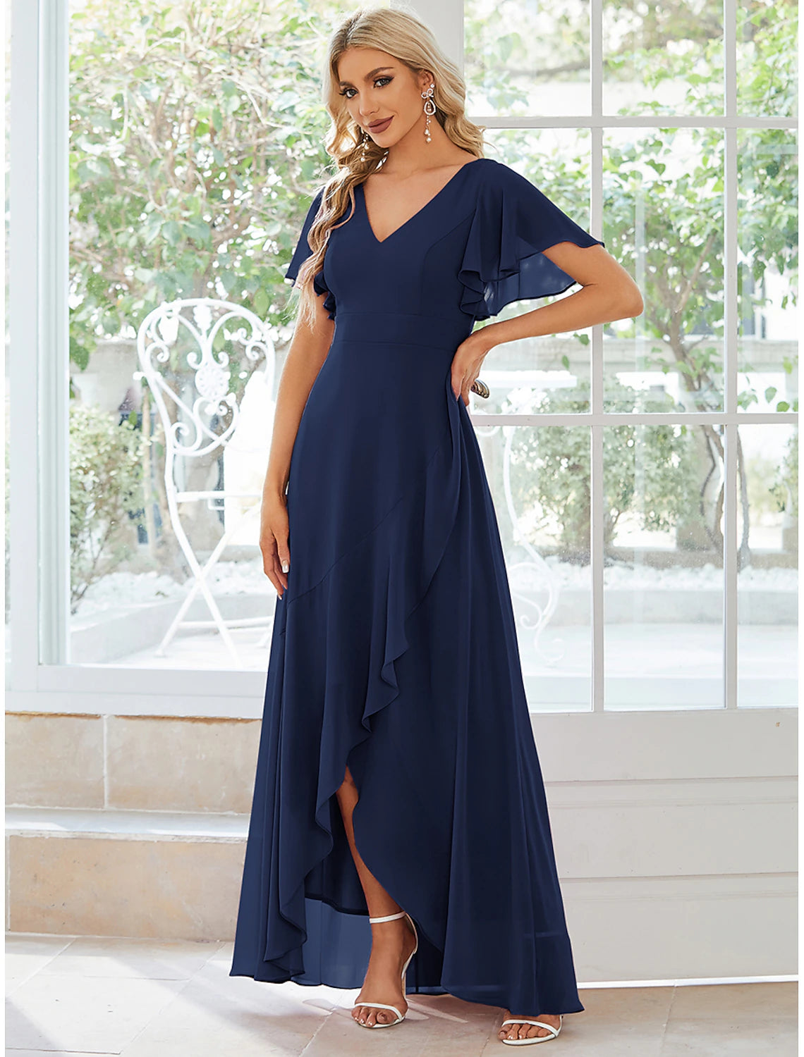 Ruffled asymmetrical chiffon wedding guest dress featuring a flattering V-neckline