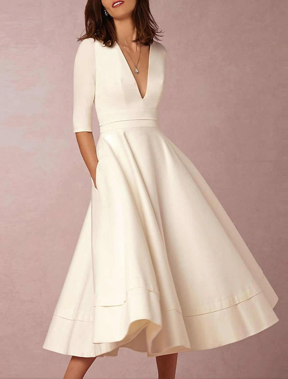 V-neck sleeveless satin beach bridal gown with court train