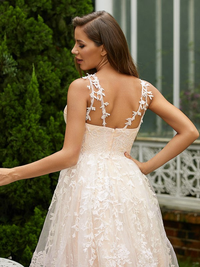 Sleeveless V-neck A-line lace and tulle dress with sweep brush train