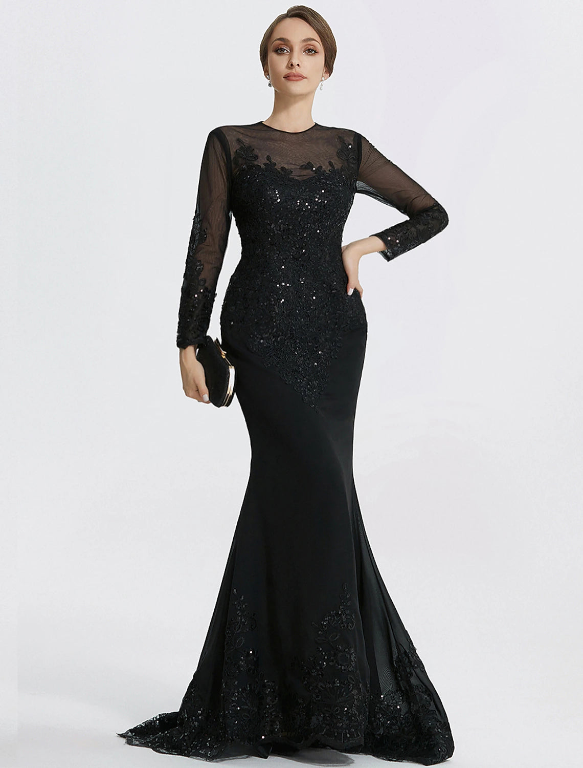 Long sleeve black formal evening dress featuring jewel neckline and lace appliques