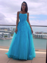 Applique detailing on A-line tulle prom dress with spaghetti straps