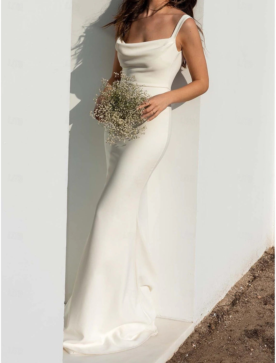 Back view and court train of sheath satin wedding gown with spaghetti straps