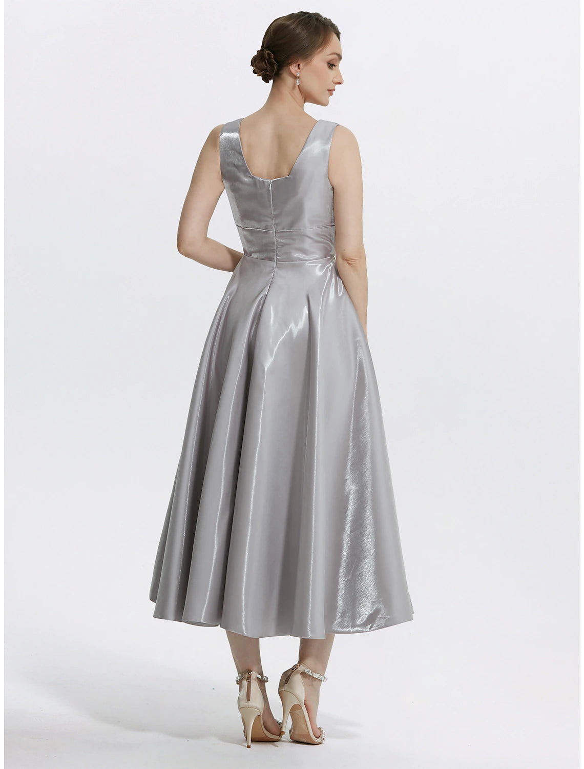 Tea-length formal wedding guest satin dress with pockets and A-line silhouette