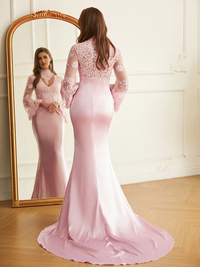 Sheath column prom dress featuring high neckline, long sleeves, and silk-like satin fabric