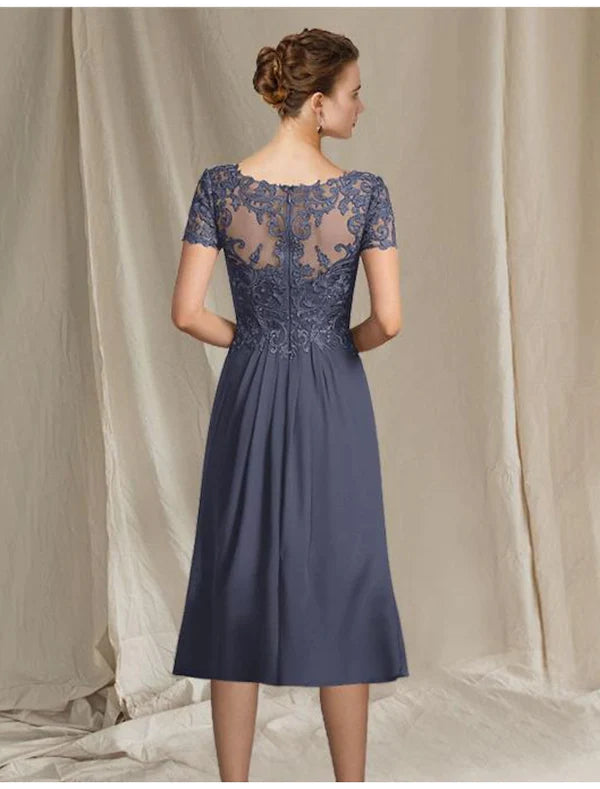 Tea-length chiffon and lace mother of the bride dress with pleats and appliques