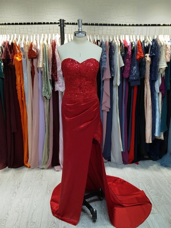 Front view of red sequin sweetheart sleeveless sheath prom dress with court train