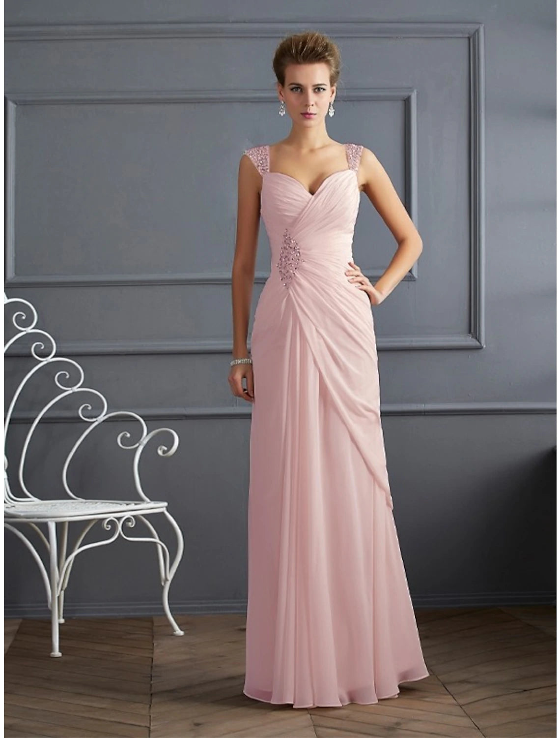 Pink floor-length chiffon mermaid evening gown with spaghetti straps and rhinestone ruched details
