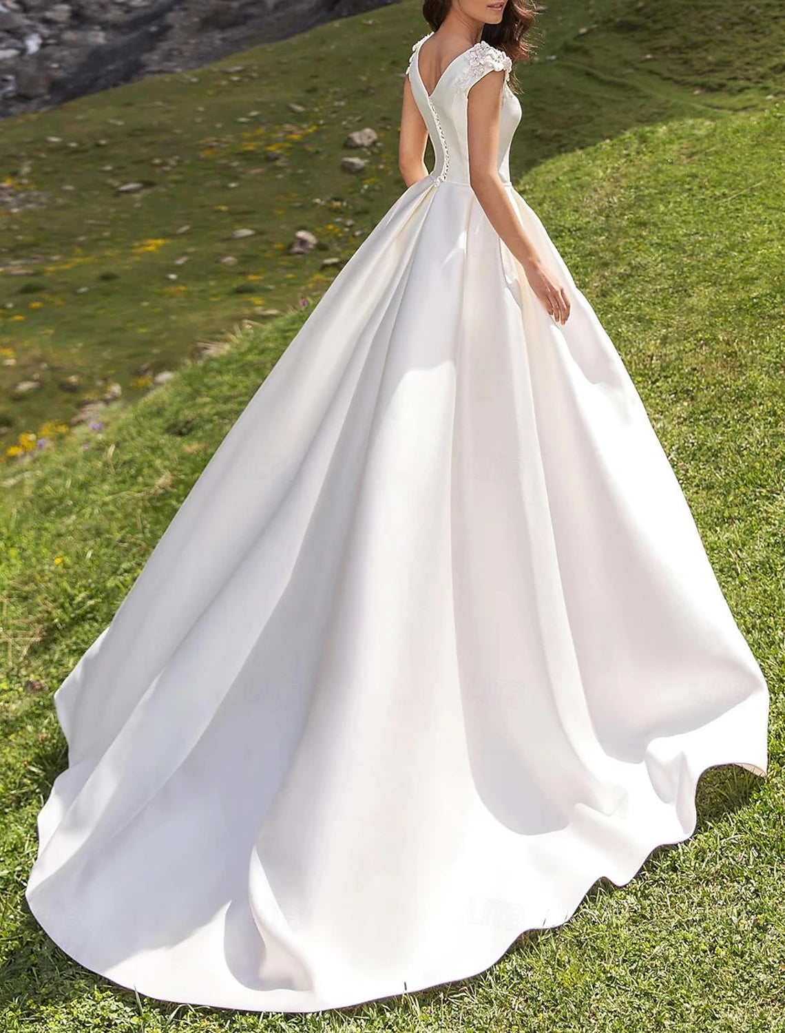 White satin ball gown bridal gown with boat neckline and cap sleeves