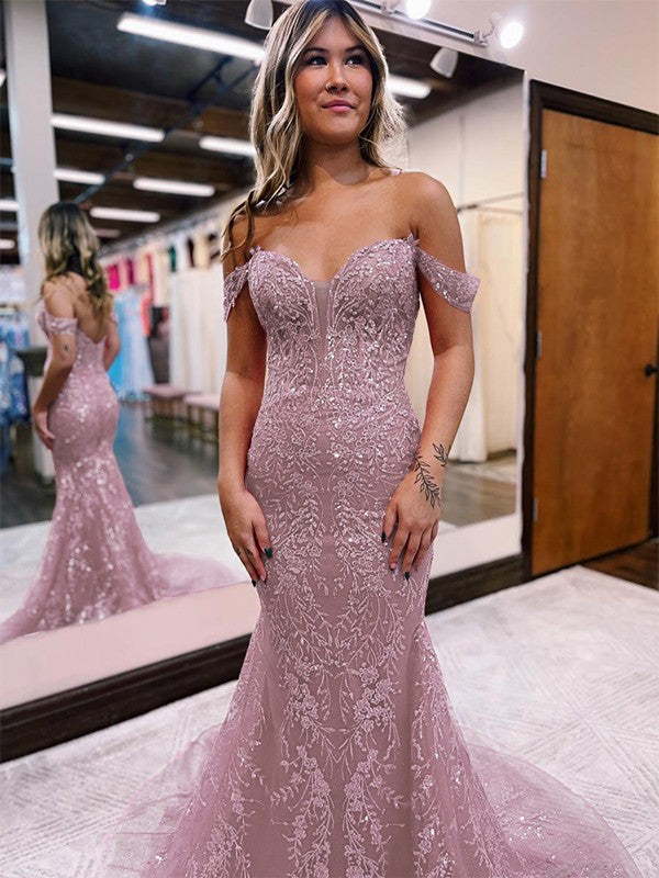 Detail of lace applique on sleeveless off-the-shoulder prom dress