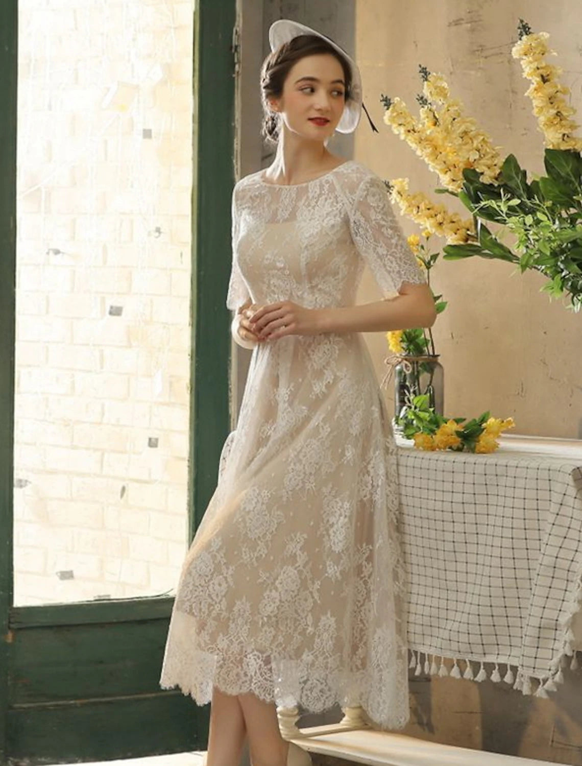 Champagne A-line tea length lace wedding dress with illusion neck and half sleeves