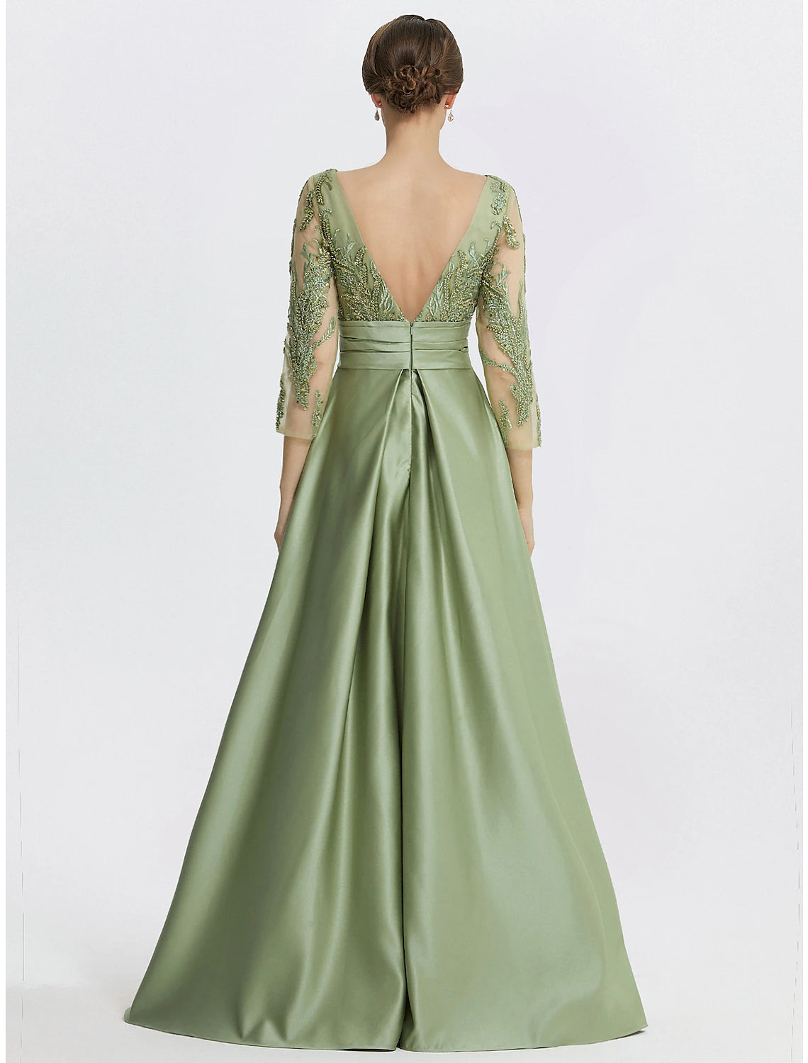 Jewel neck satin evening gown in Clover highlighting embroidery appliques, 3/4 length sleeves, and a skirt slit