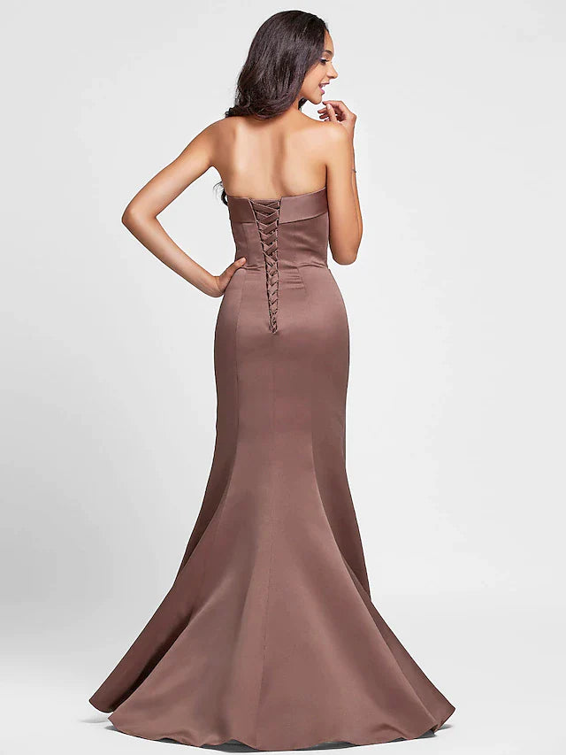 Back view of strapless satin mermaid bridesmaid dress showing lace-up closure