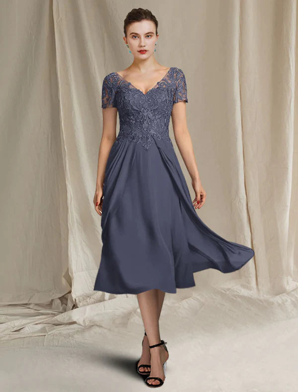 A-line tea-length chiffon and lace mother of the bride dress with V-neck, short sleeves, and pleats