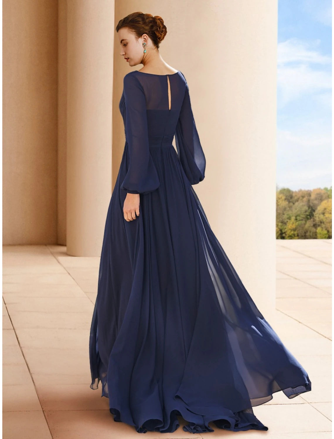 Floor-length A-line mother of the bride dress crafted from solid color chiffon with long sleeves
