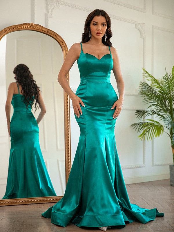Ruched sleeveless V-neck sheath dress crafted in elastic woven satin with brush train