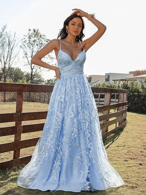 A-line lace prom dress featuring ruffles and a sweep brush train