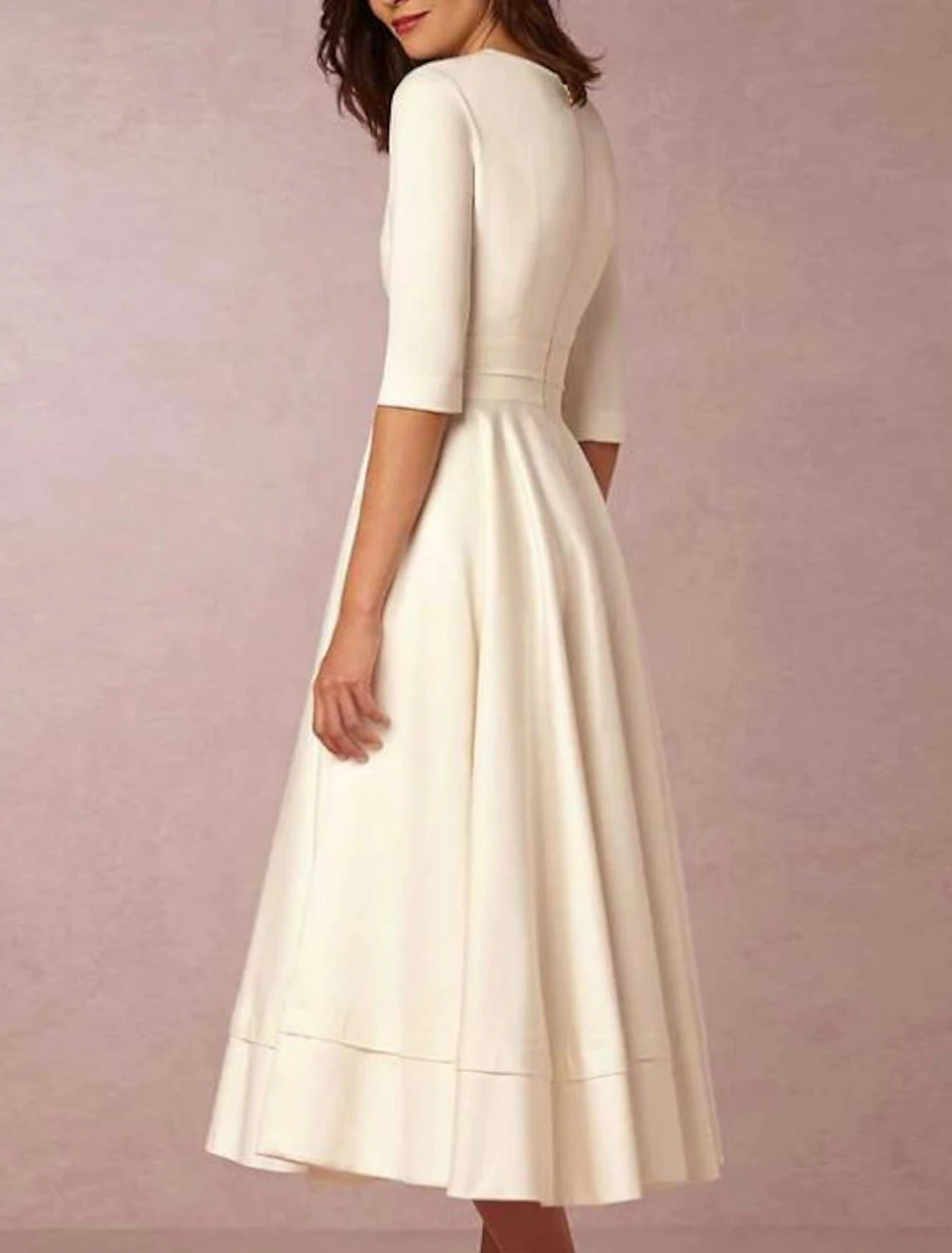 Sleeveless satin beach wedding dress with V-neckline and ruched pleats