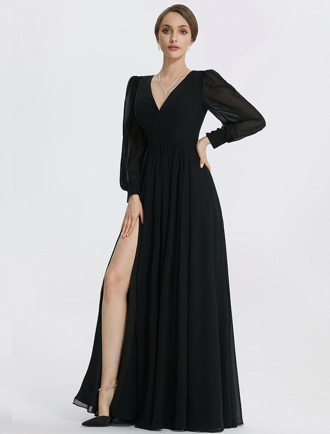 Bodice detail of long sleeve V-neck chiffon evening gown
