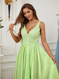 Sleeveless floor-length A-line princess gown featuring lace and elastic woven satin