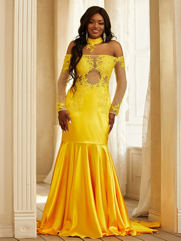 Applique detailing and sweep/brush train on an elastic woven satin trumpet/mermaid prom dress