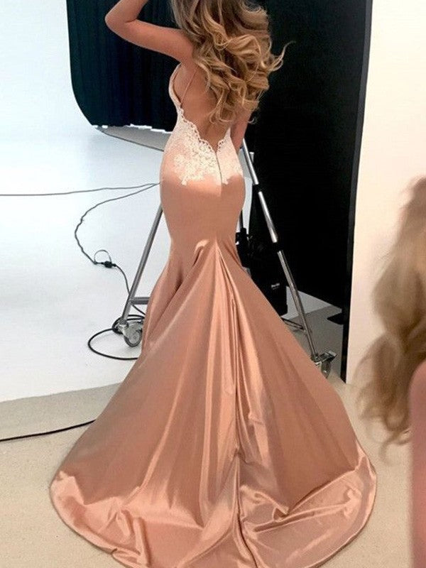 Detailed view of trumpet/mermaid silk-like satin prom dress with straps, applique, and court train