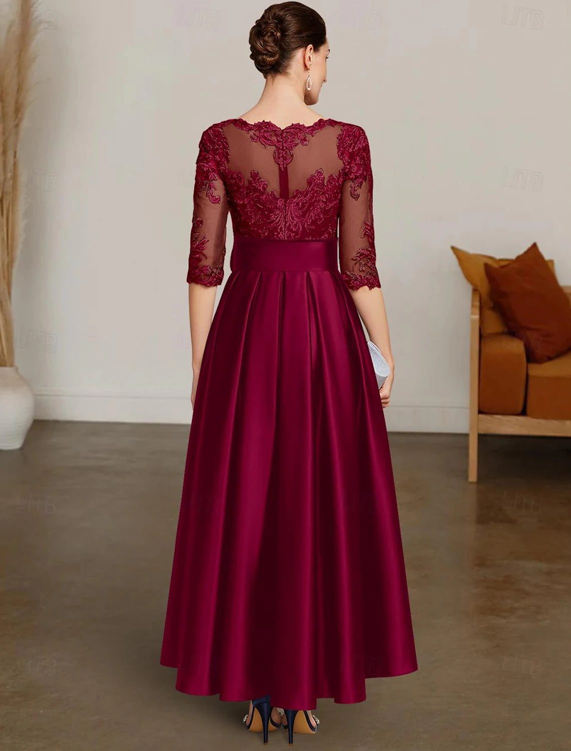 A-line asymmetrical high-low satin and lace mother of the bride dress with lace sash