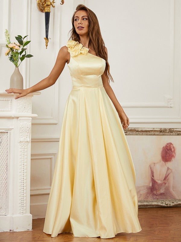 Hand-made flower embellishment on one-shoulder satin prom dress