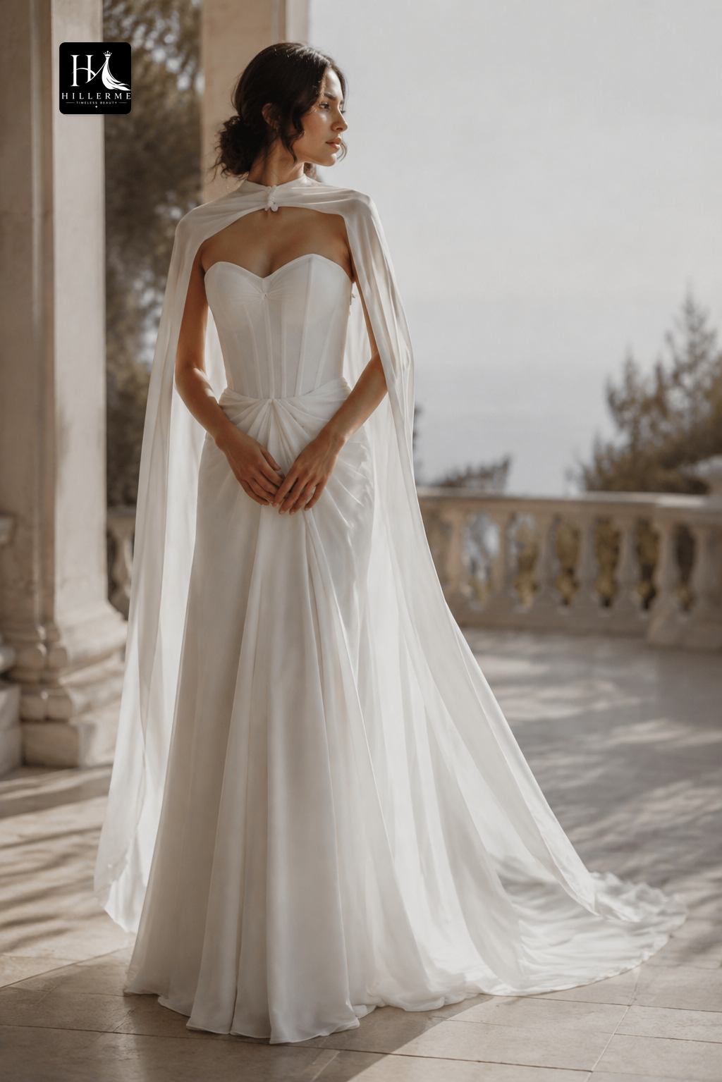 Ethereal Strapless Corset Bridal Gown with Flowing Chiffon Cape