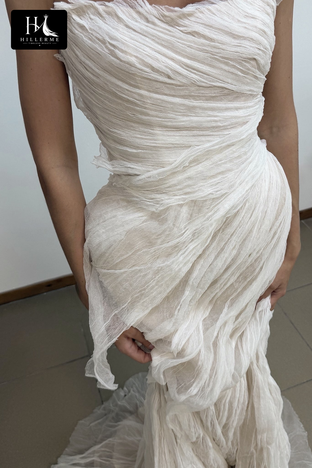 Strapless Mermaid Gown with Ruched Bodice and Draped Overskirt