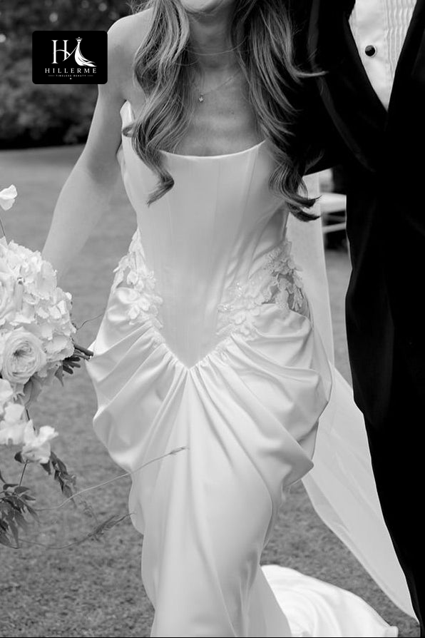 Elegant Strapless Corset Bridal Gown with Asymmetrical Ruched Skirt and Sweep Train